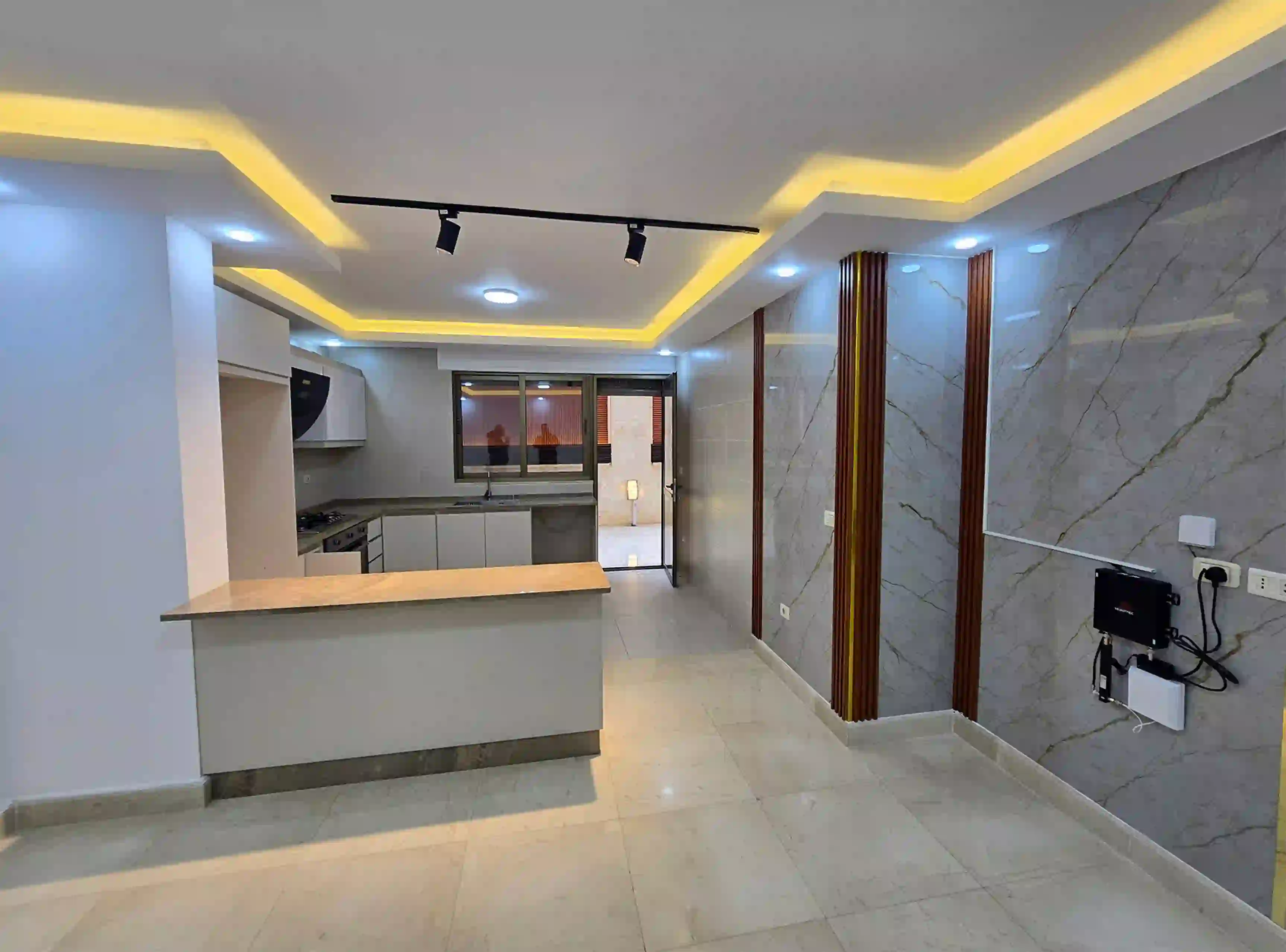 Jabal Amman - Semi-basement apartment with a distinctive terrace for rent (unfurnished, 2 bedrooms)