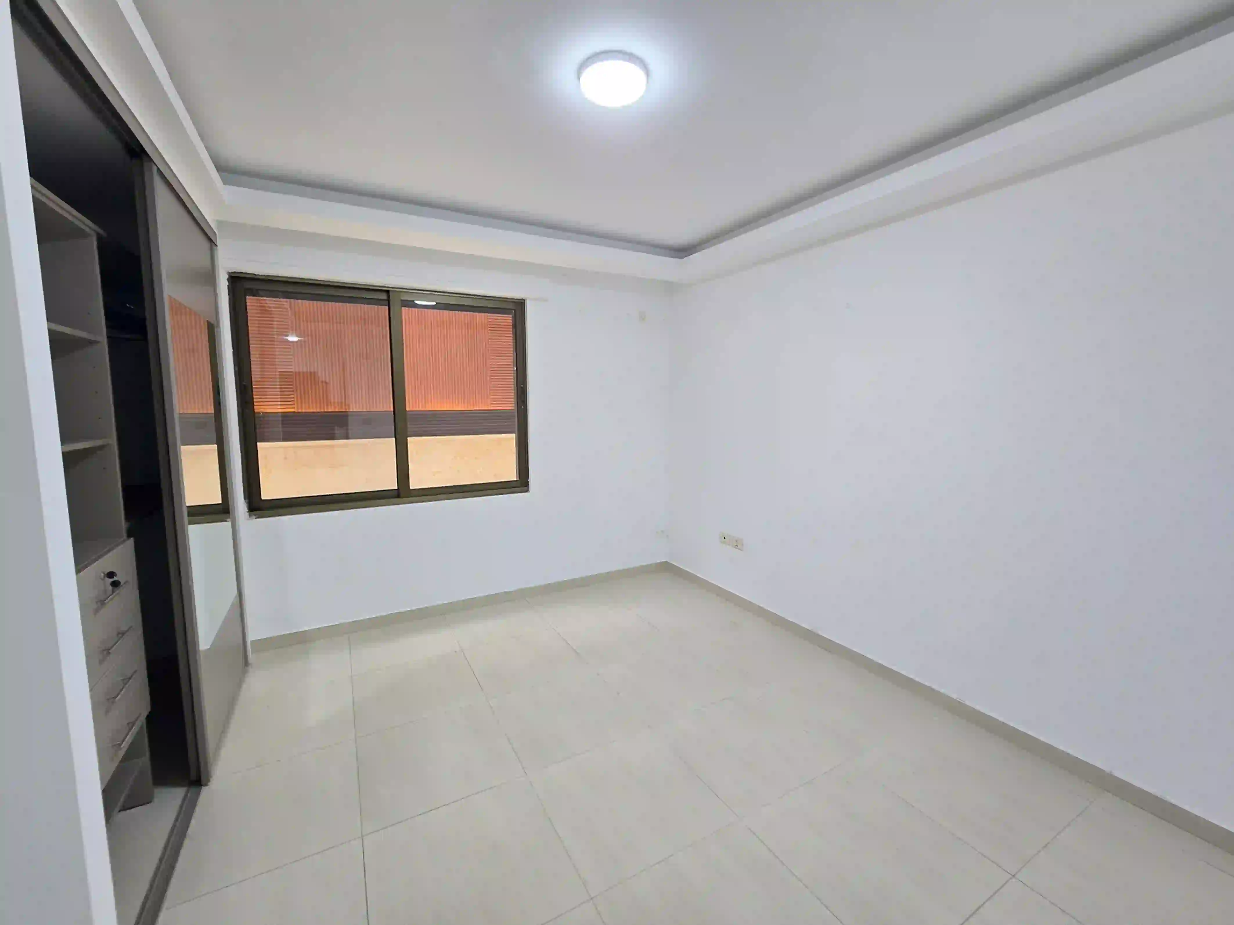 Jabal Amman - Semi-basement apartment with a distinctive terrace for rent (unfurnished, 2 bedrooms)