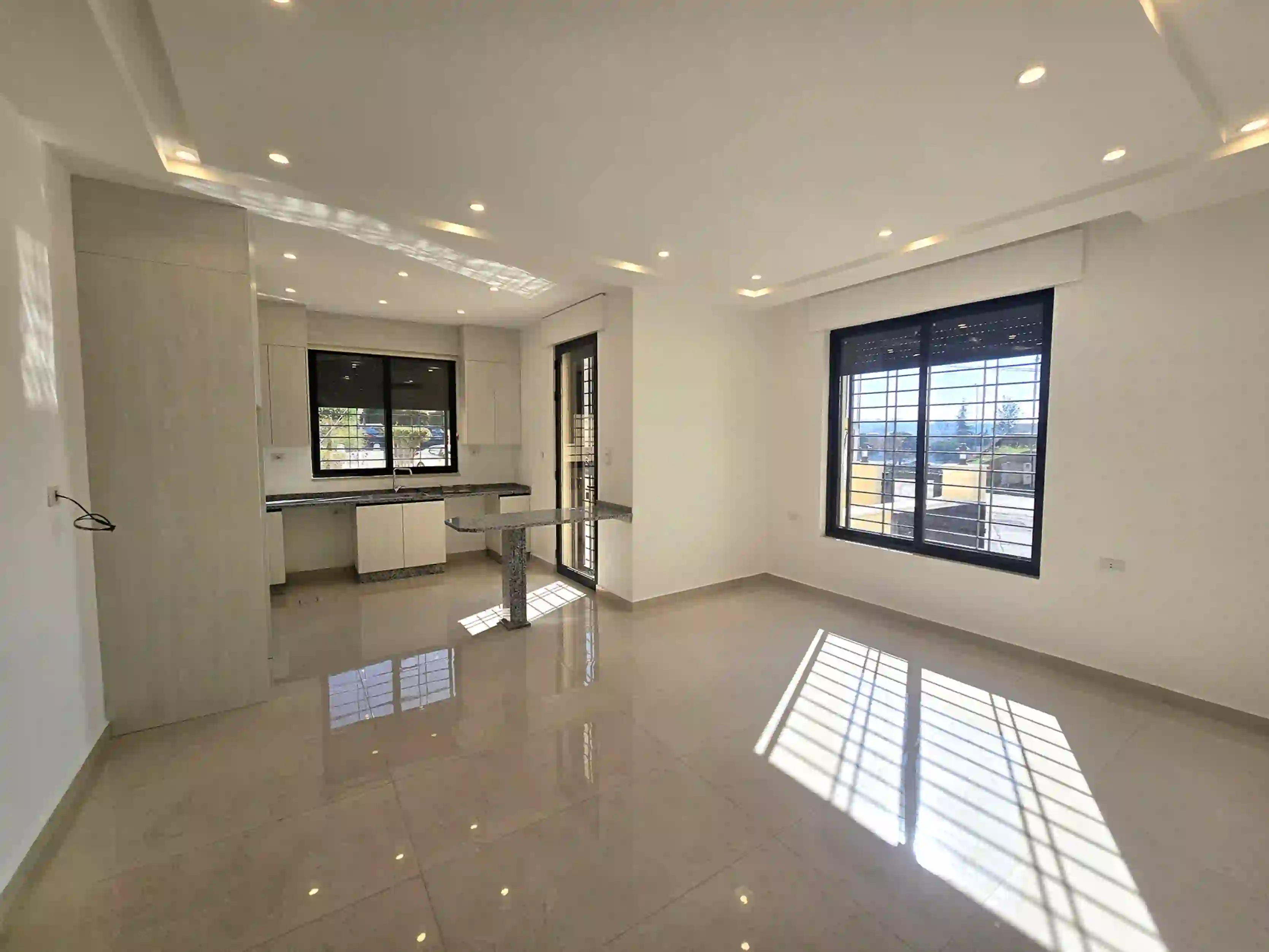Abdoun Brand New Semi-Furnished Ground Floor 2-Bedroom 110sqm Apartment with 50sqm Terrace & Private Garage for Annual Rent 10,000 JD 2