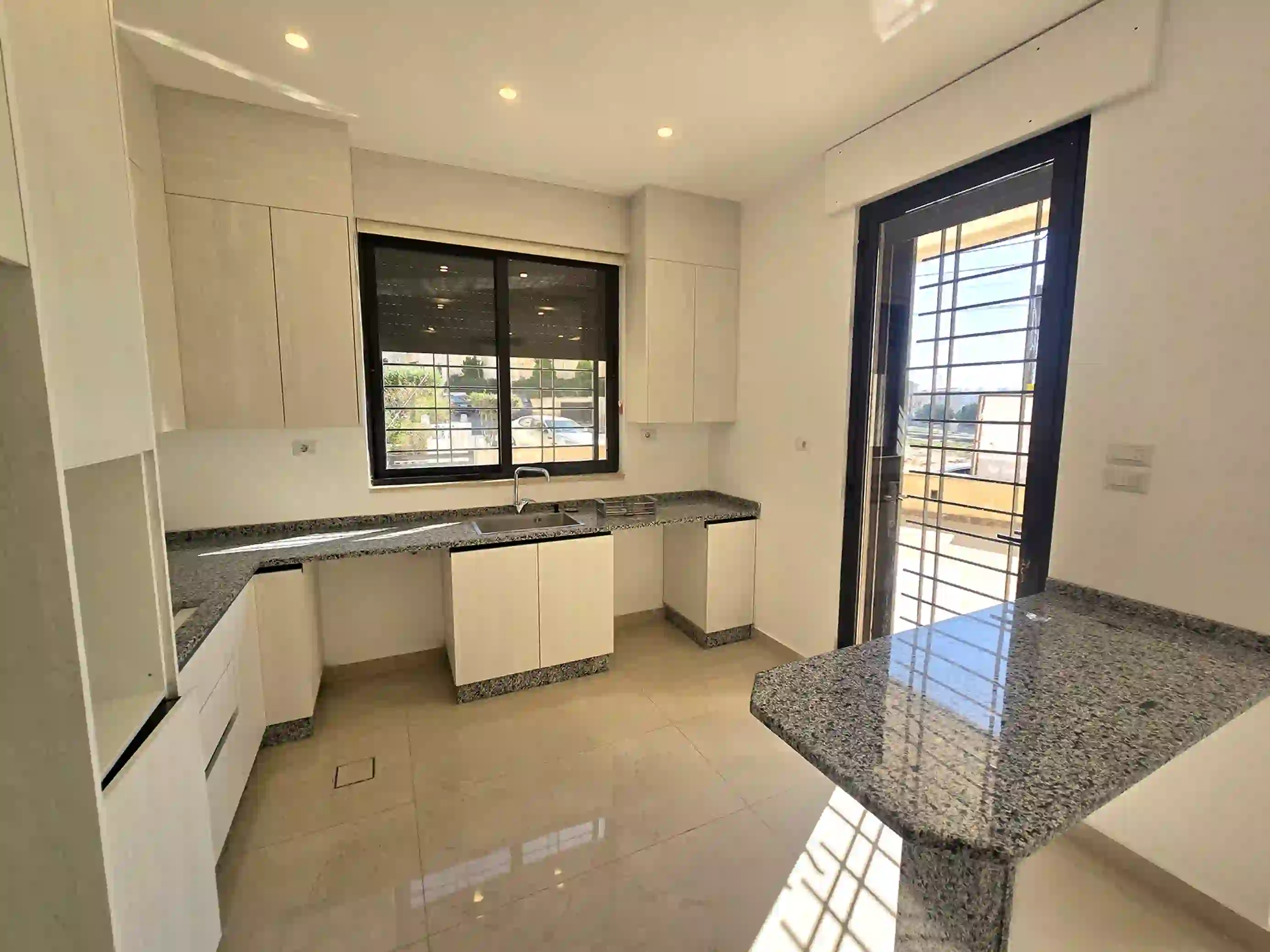 Abdoun Brand New Semi-Furnished Ground Floor 2-Bedroom 110sqm Apartment with 50sqm Terrace & Private Garage for Annual Rent 10,000 JD 3