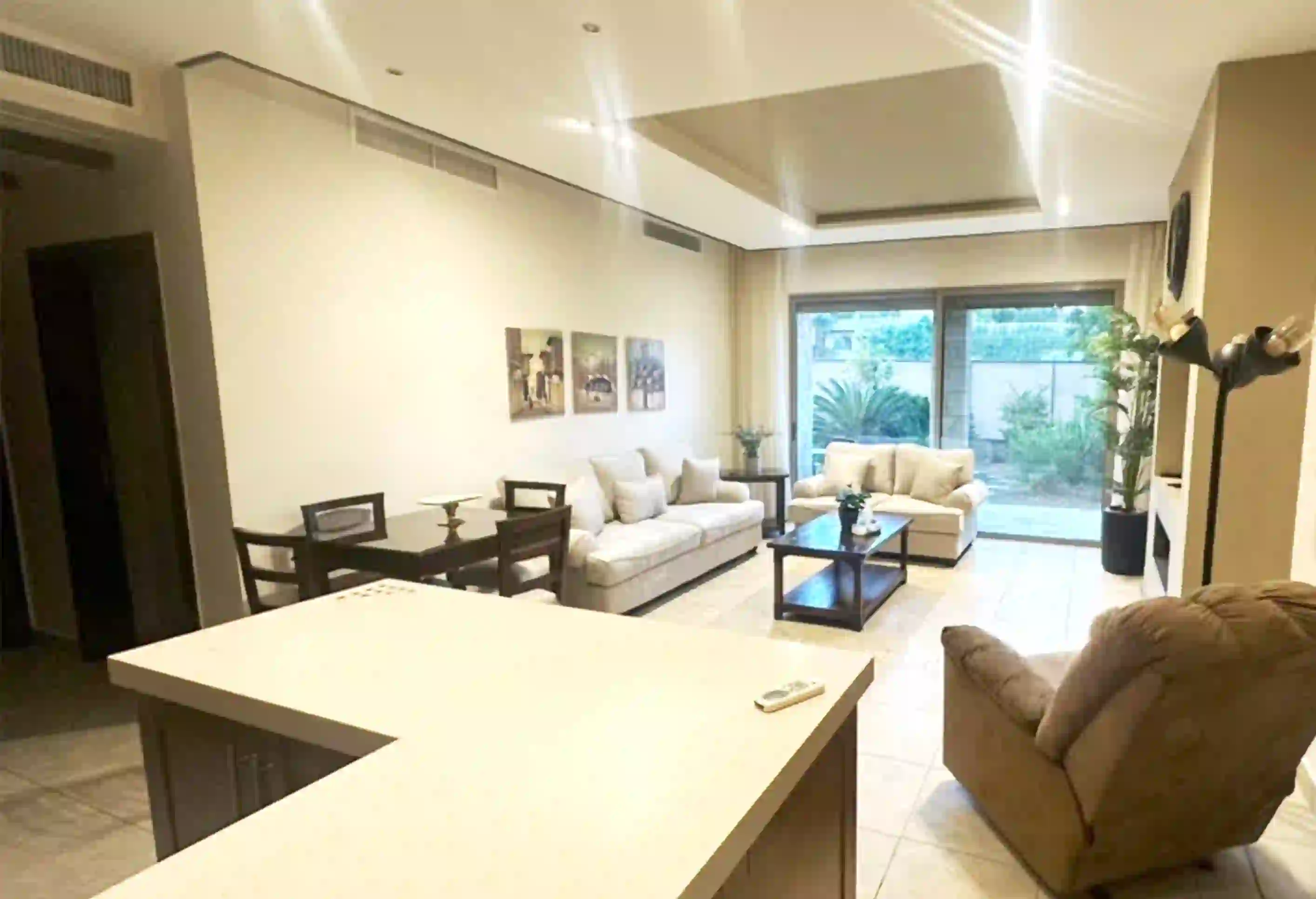 Abdoun Luxury Furnished Ground Floor 2-Bedroom 90sqm Apartment with Private 50sqm Garden for Annual Rent 10,500 JD 2