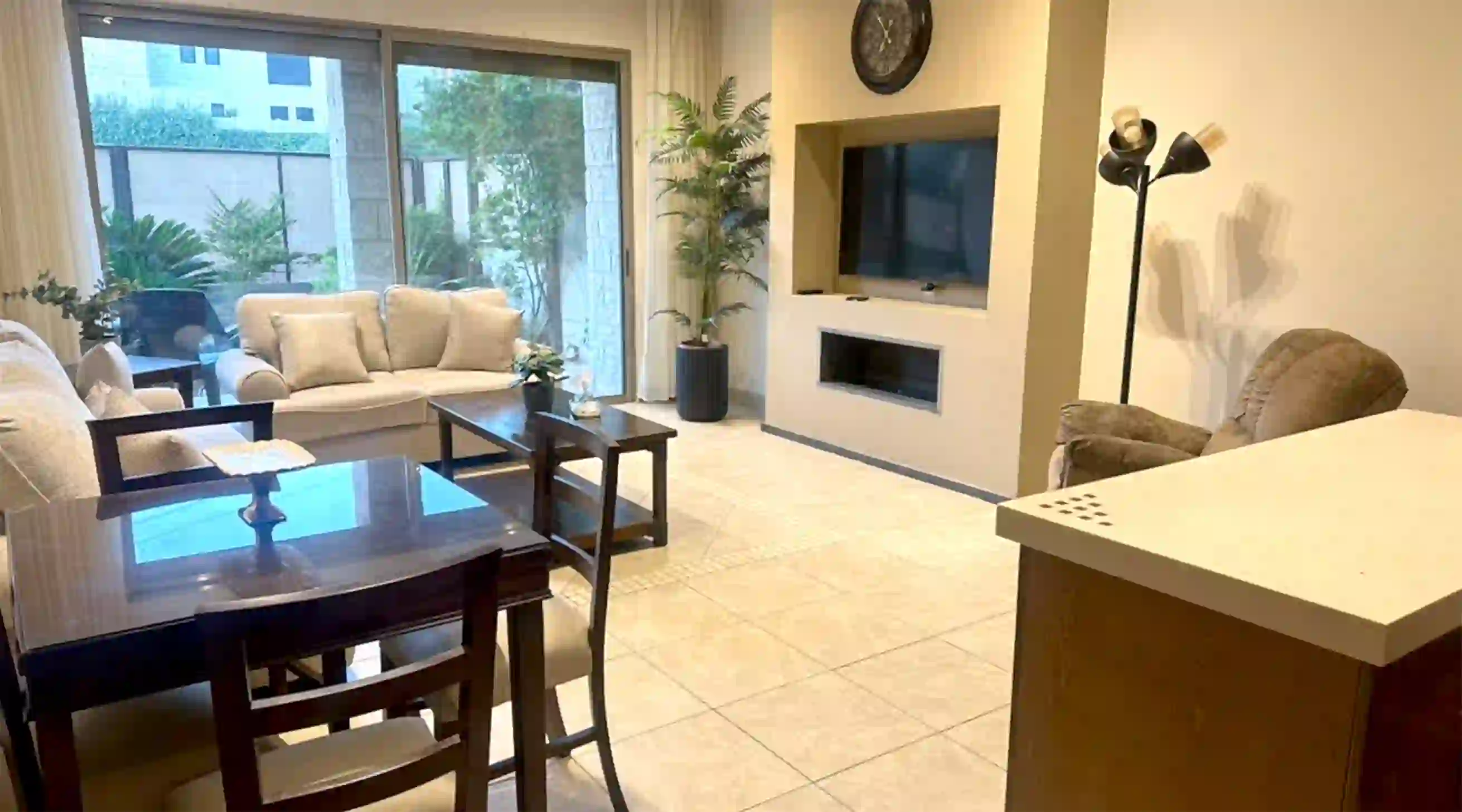 Abdoun Luxury Furnished Ground Floor 2-Bedroom 90sqm Apartment with Private 50sqm Garden for Annual Rent 10,500 JD 3