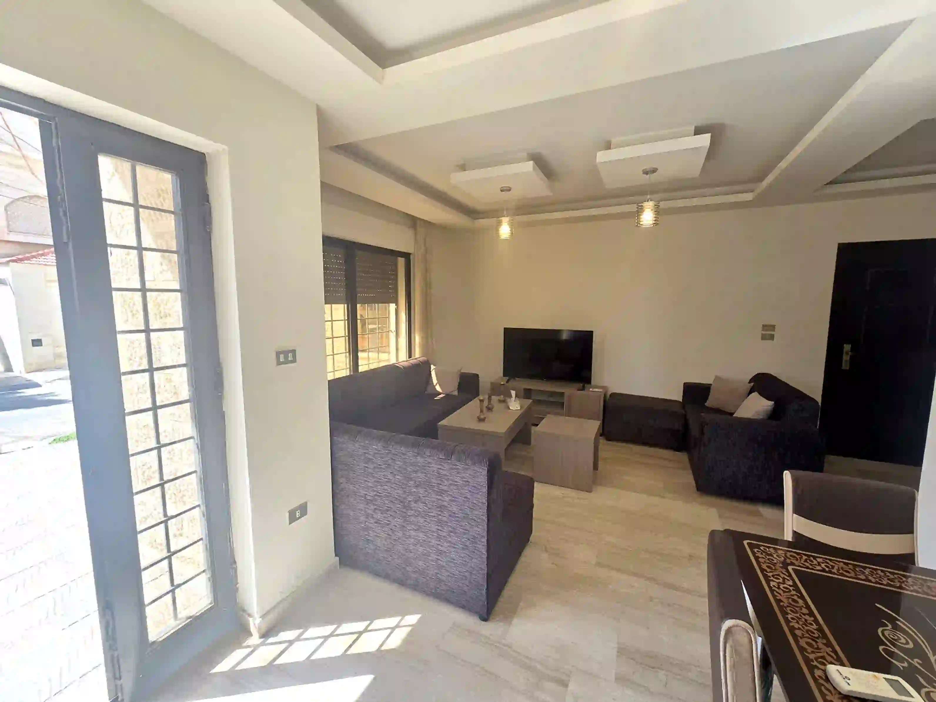 Dahiyat Al Amir Rashid Luxury Furnished Ground Floor 3-Bedroom 130sqm Apartment with Terrace & Private Garage for Annual Rent 7,500 JD 2