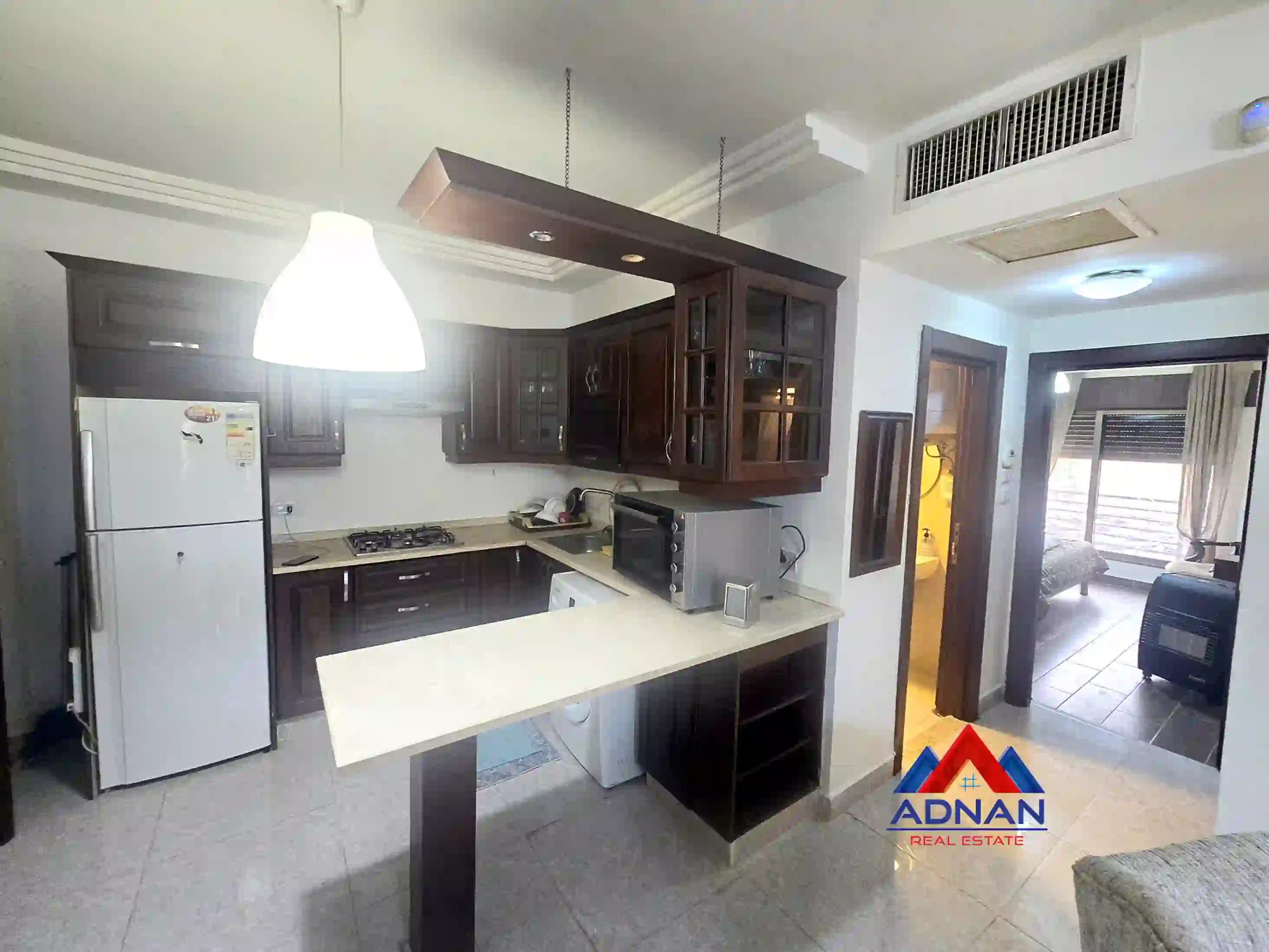 Abdoun Luxury Furnished 2-Bedroom First Floor 100sqm Apartment with Central AC for Annual Rent 6,800 JD 2