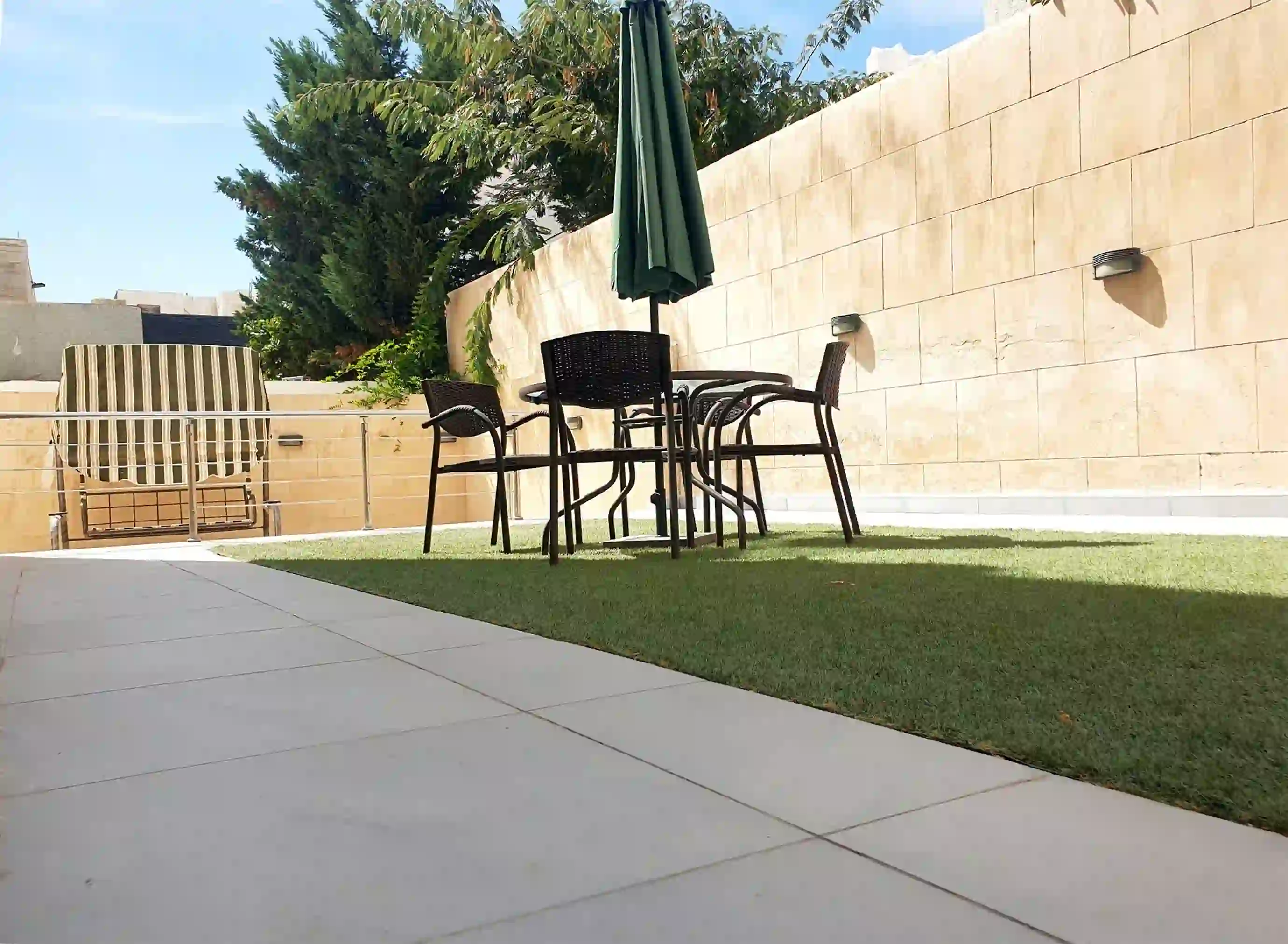 Abdoun Luxury Ground Floor Furnished 2-Bedroom Apartment with Large Private Garden for Annual Rent 14,000 JD 2